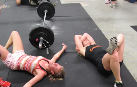 Athletes resting after a workout from thewodlife.com.au